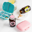 Pink supplement organizer